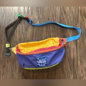 Cotopaxi Cross Body in Purple, Yellow, and Orange